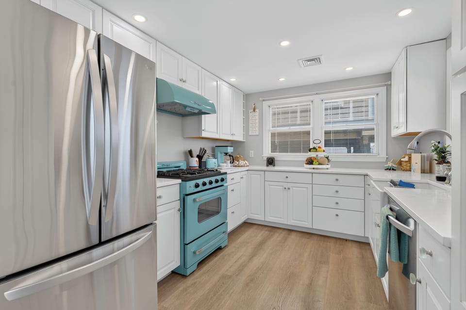 Prepare your favorite meals in a bright kitchen with modern appliances and plenty of workspace.