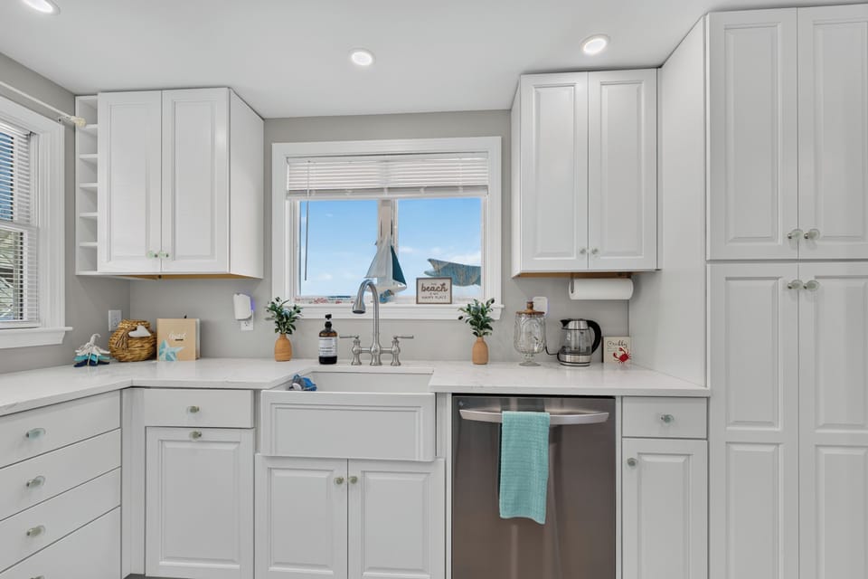 A clean, well-equipped kitchen with generous counter space and everything needed for your stay.