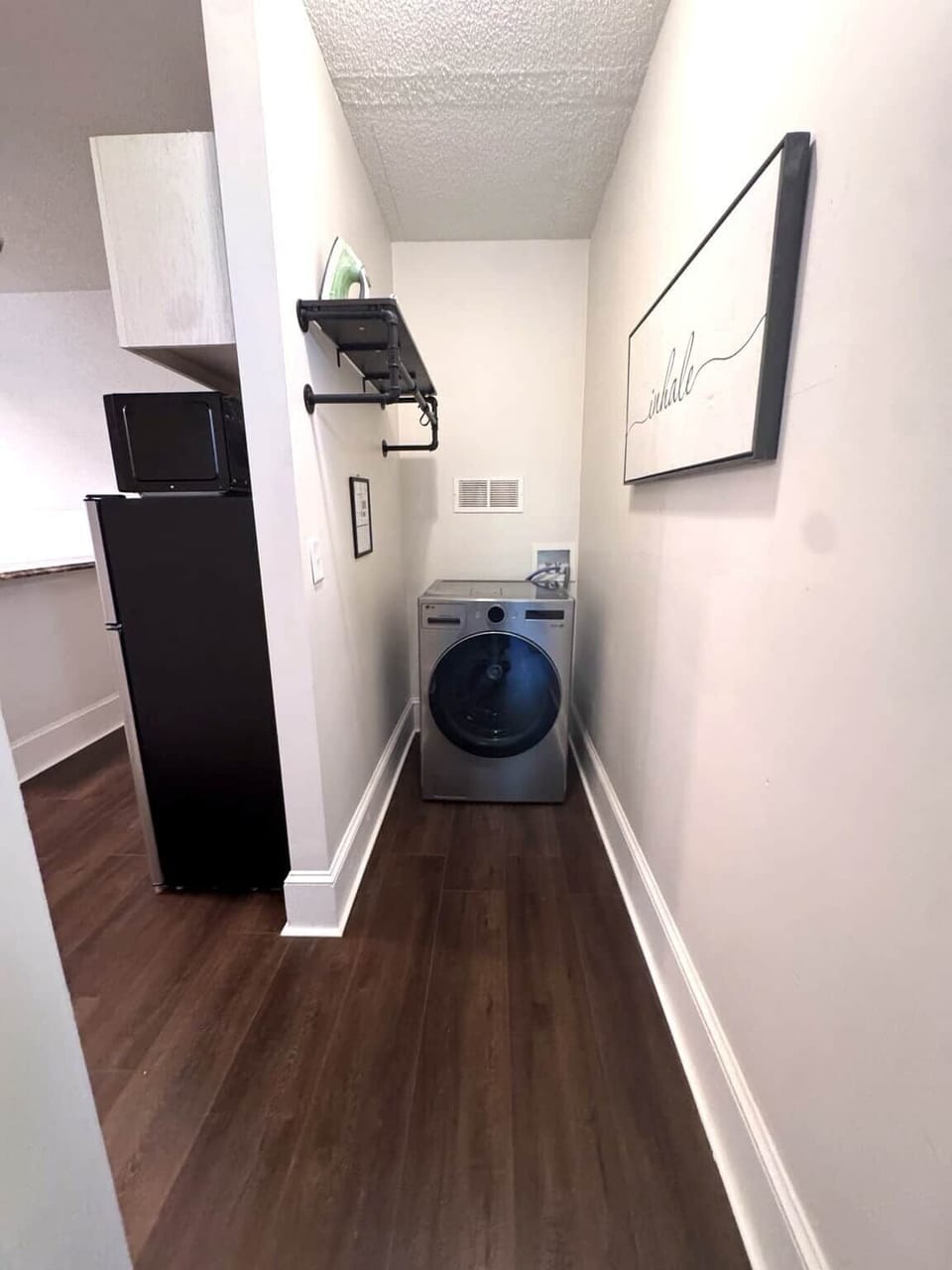 Washer-dryer combo in Chef’s Château Suite C