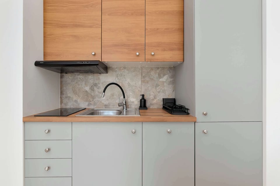 The fully equipped kitchenette includes everything you need for a home-cooked meal.