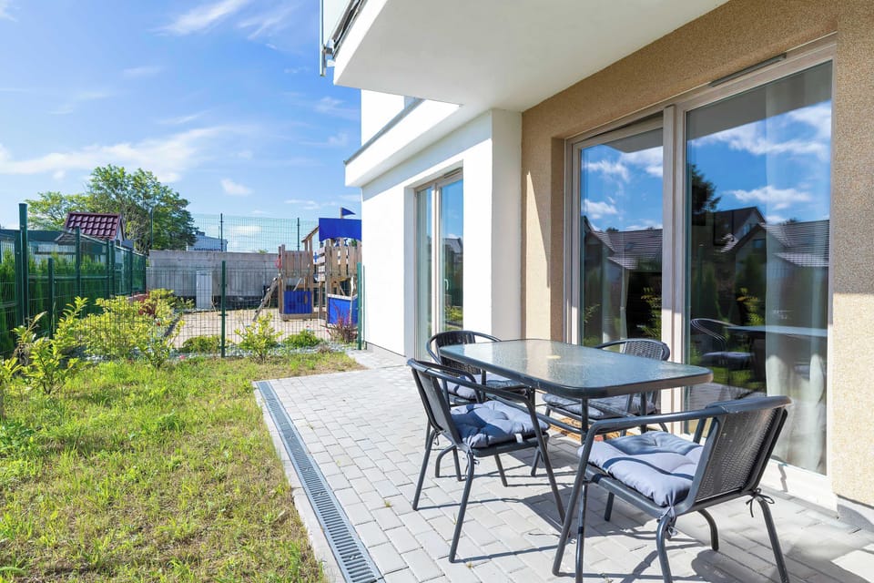 The garden provides a perfect spot for enjoying the fresh air. 
