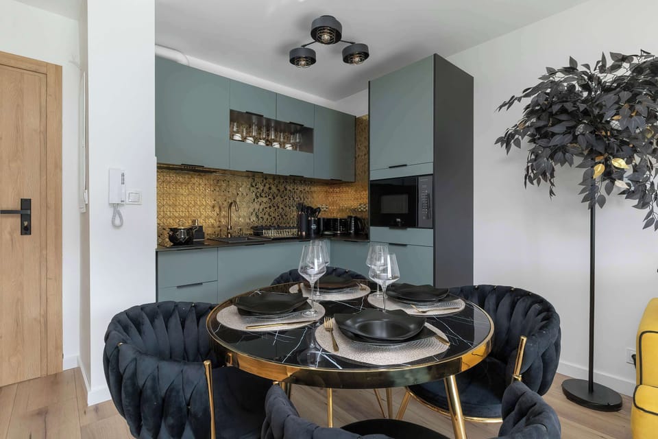 Cook and dine in style with the modern kitchenette and dining area.