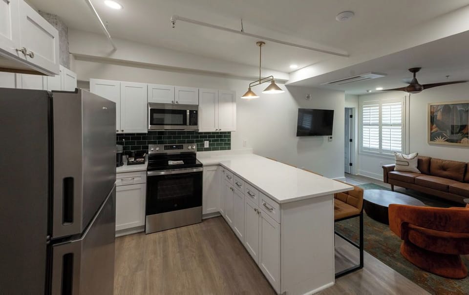 Modern open kitchen and cozy living space with stylish finishes
