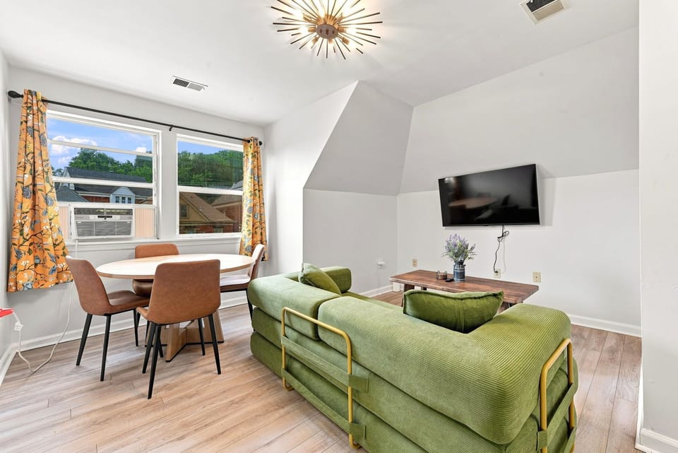 Living room With Dining Area, Sleeper Sofa and 50" Smart TV
