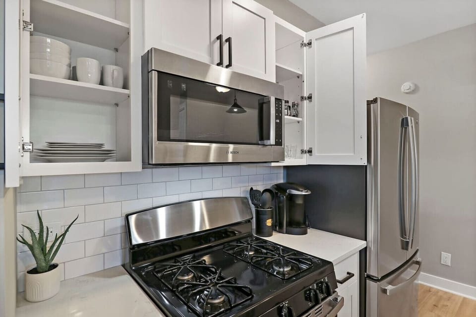 Prepare delicious meals in our fully stocked kitchen, complete with brand new appliances.