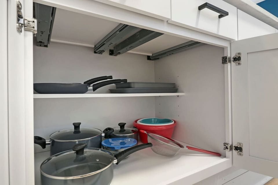 The kitchen is fully equipped with all the essential cookware and bakeware.