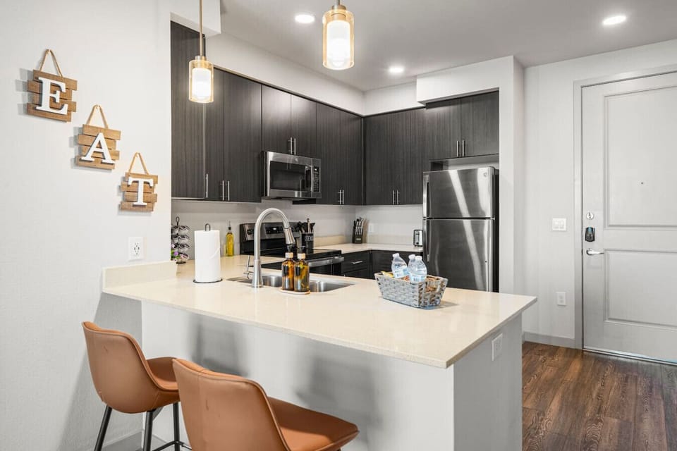 Enjoy casual meals and conversation at the kitchen breakfast bar.