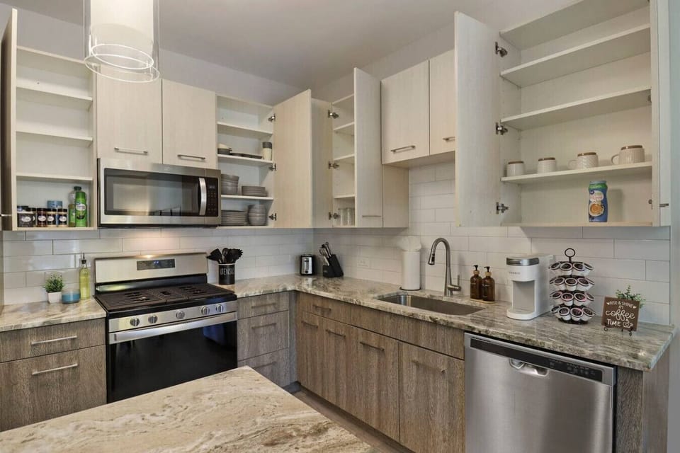 Fully equipped kitchen with all amenities you need for a home-cooked meal.