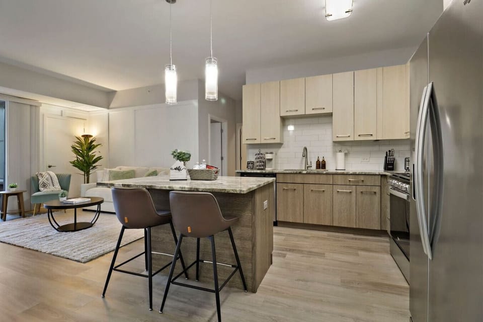 Gather around the stylish island for breakfast, lunch, or dinner.