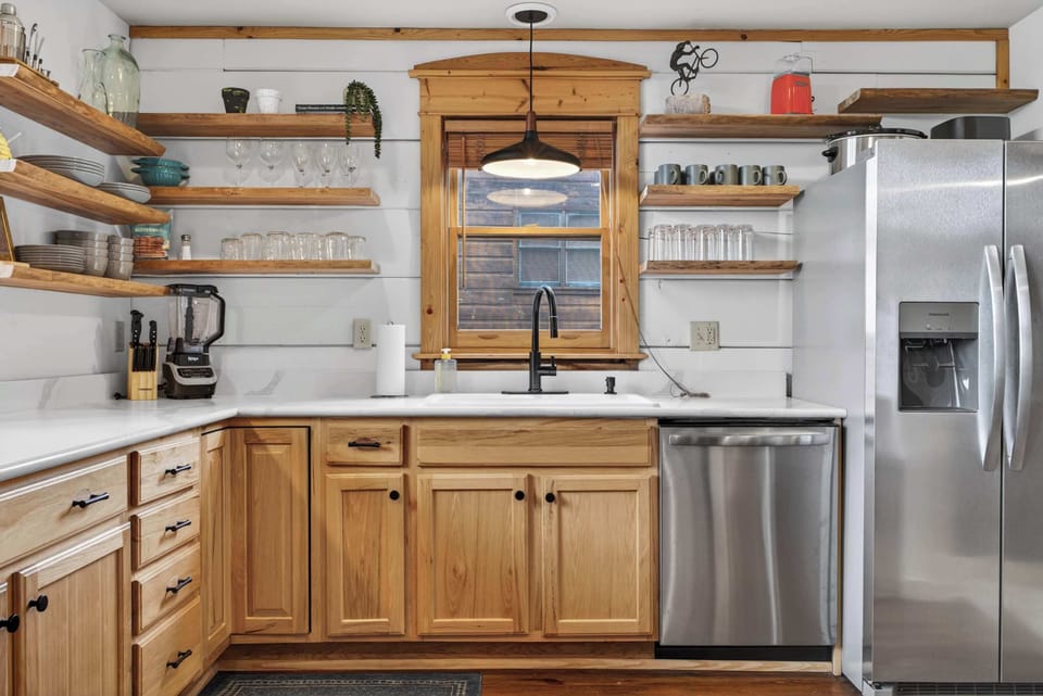 Chef’s Dream Kitchen – Fully stocked with high-end appliances and plenty of cabinetry, making cooking a breeze.


