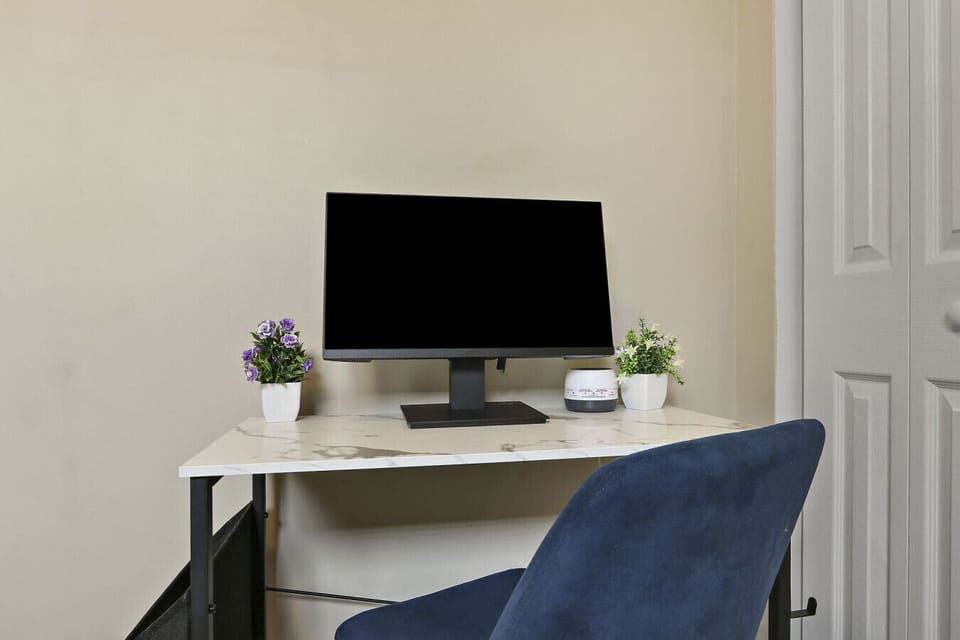 Working desk with monitor, simplify working from home.