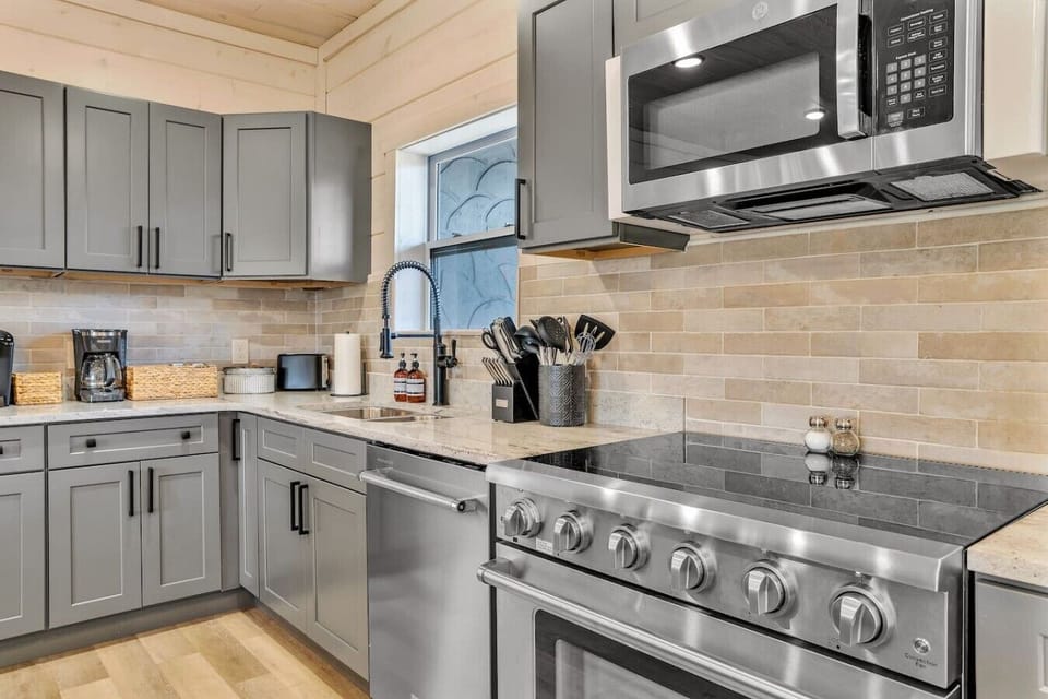 Full chef`s kitchen adjacent to royal living room.