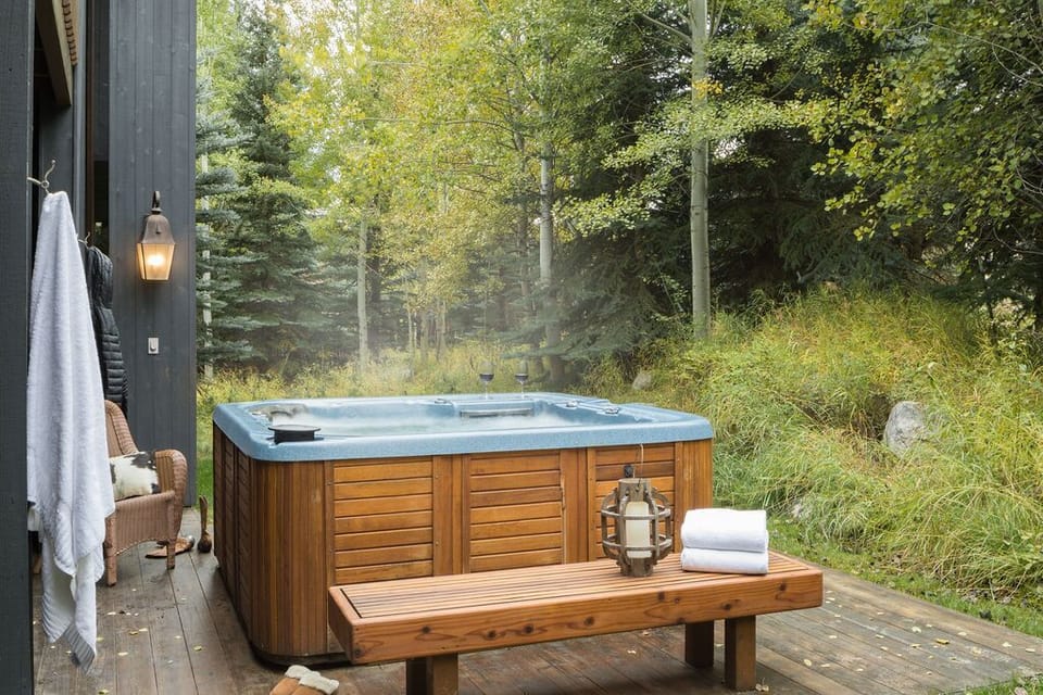 Soak in the bubbling hot tub on the deck, surrounded by the sound of wind through the trees.