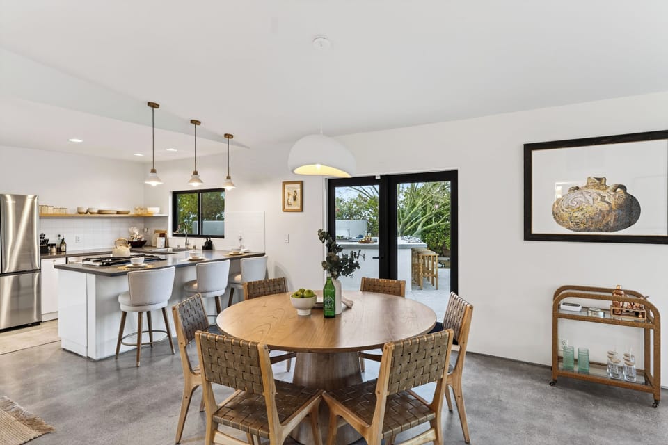 Gourmet kitchen island and the central dining area.