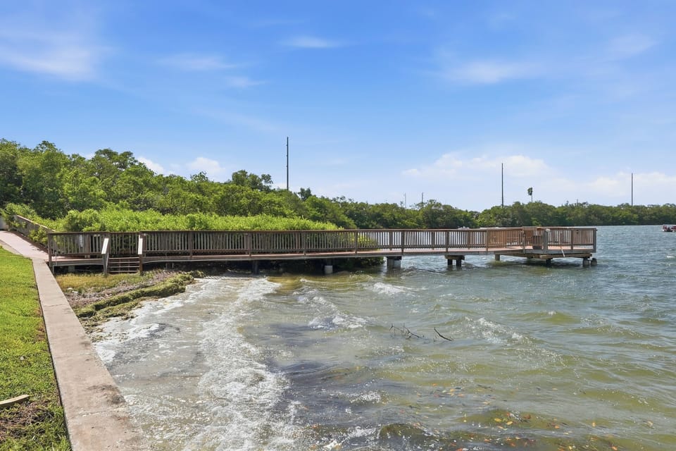 Enjoy the peaceful waterfront surroundings at the community fishing pier, a relaxing spot to take in the views and experience the laid-back coastal atmosphere.
