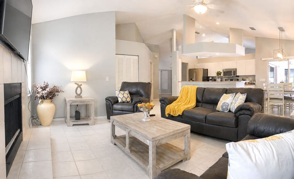 Bright open-concept Living Room with vaulted ceilings
