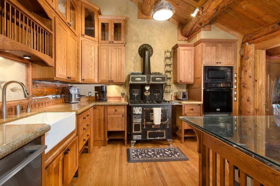 View of kitchen, and vintage stove