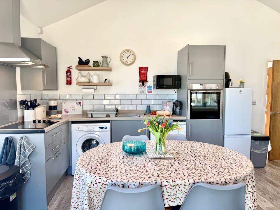 The Pepper Pot, Niton; Well equipped kitchen and Dining table