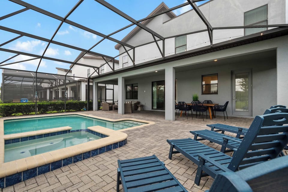 Relax poolside, soak in the bubbling spa, or gather for outdoor dining in this beautiful backyard oasis. Designed for unforgettable vacations, every moment here is made for making memories together.