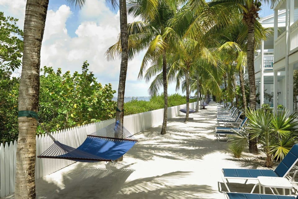 Drift in a hammock while waves and palms set the mood.