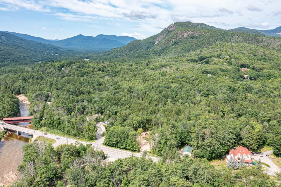 Aerial view with Bernerhof Inn, Saco River, and surroundings