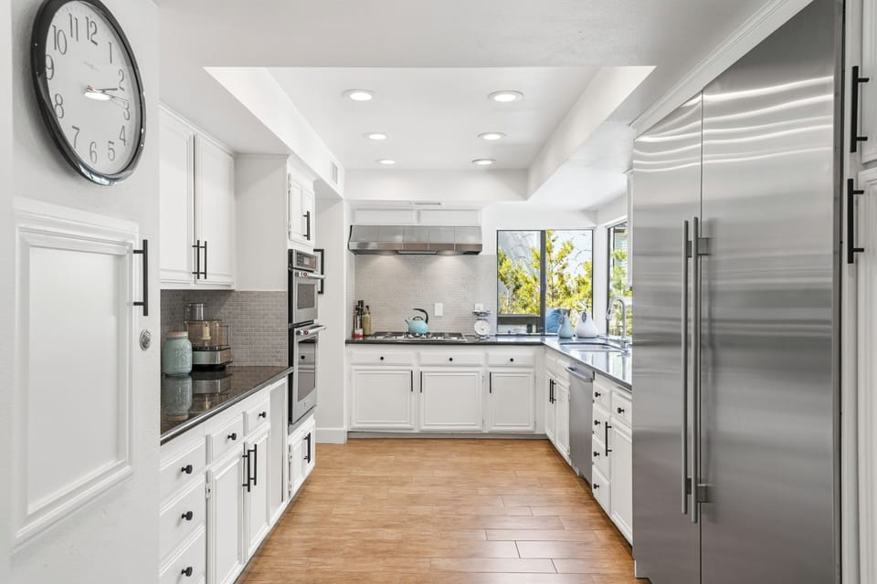 Gourmet Kitchen w/xtra large Sub Zero Refrigerator and Dumb Waiter from Garage 