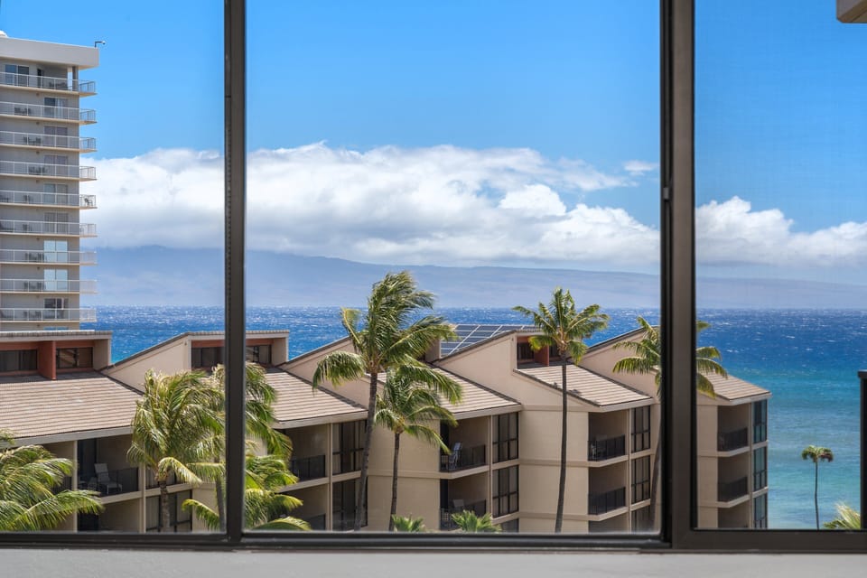 Take in sweeping views of the Pacific and tropical resort grounds without ever leaving the bedroom.
