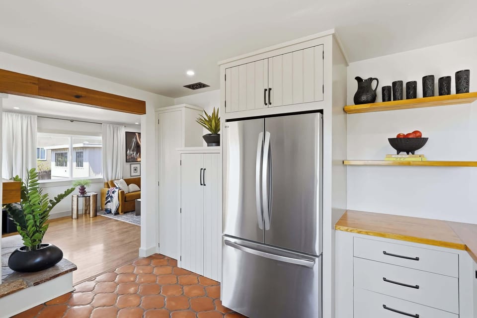 Modern kitchen with warm, stylish details ✨🍳