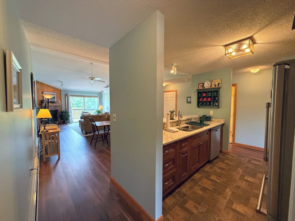 Open concept kitchen dining and living areas.
