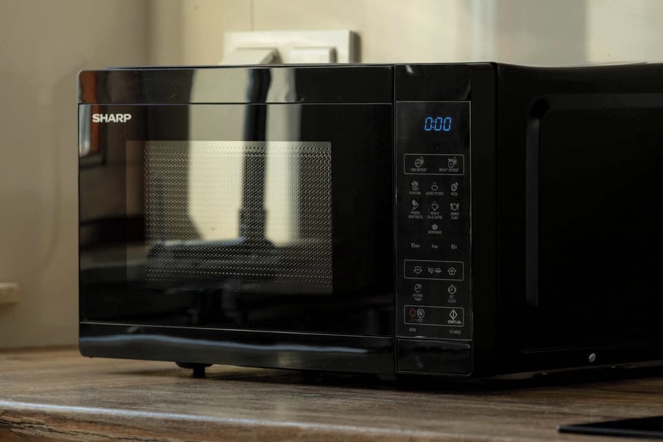 Convenient microwave oven provided for quick and easy meal preparation.