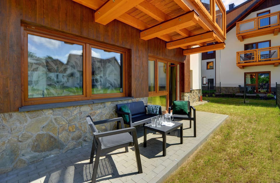 The garden provides a perfect spot for enjoying the fresh air. 
