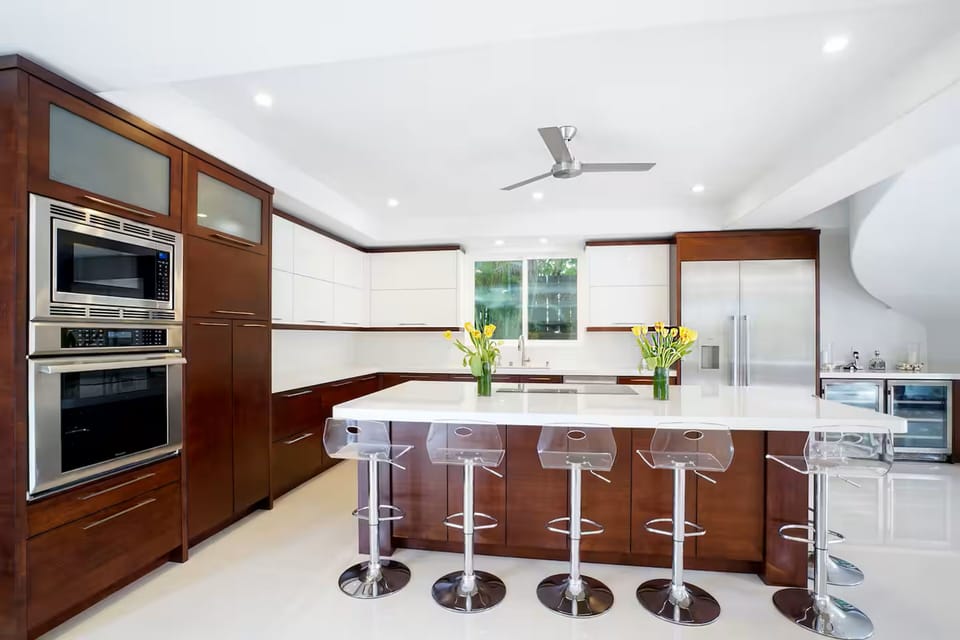 Rich wood cabinetry and counter space enough for a group that likes to cook.