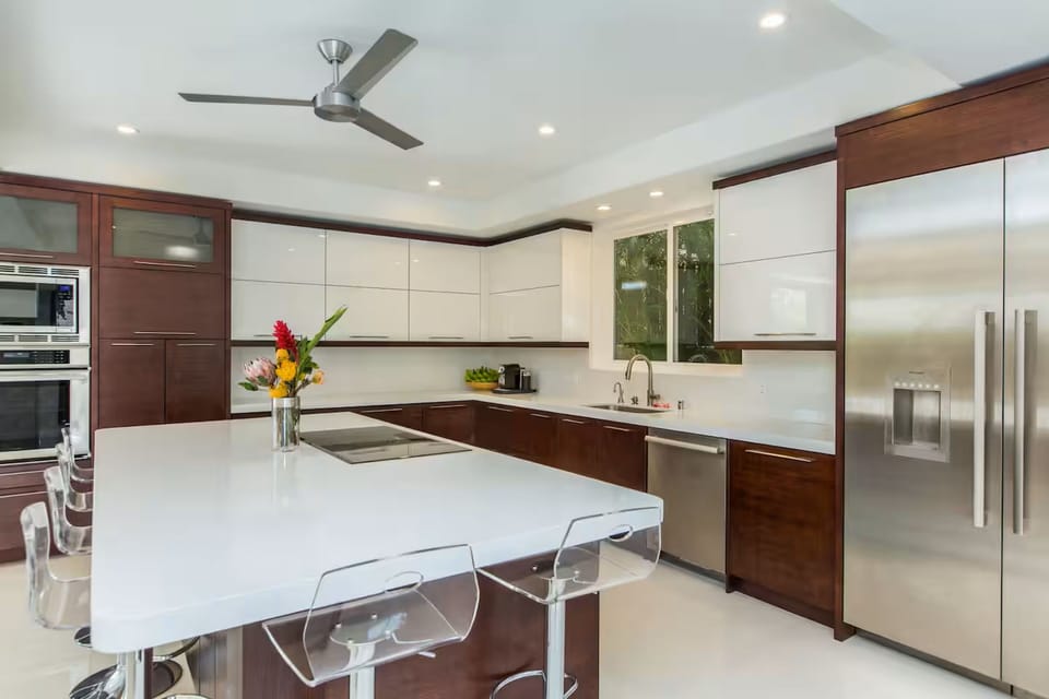 Pull up a stool at the island while dinner comes together in the guest house kitchen.
