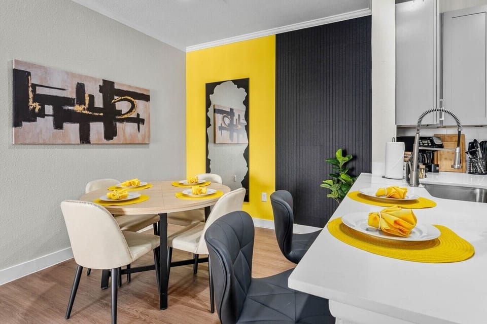 Comfortable dining area with additional bar seating perfect for shared meals and game nights.