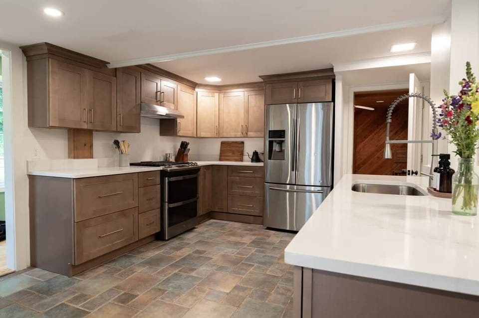 Enjoy our chef's kitchen! Brand new kitchen with quartz countertops and custom cabinetry. 