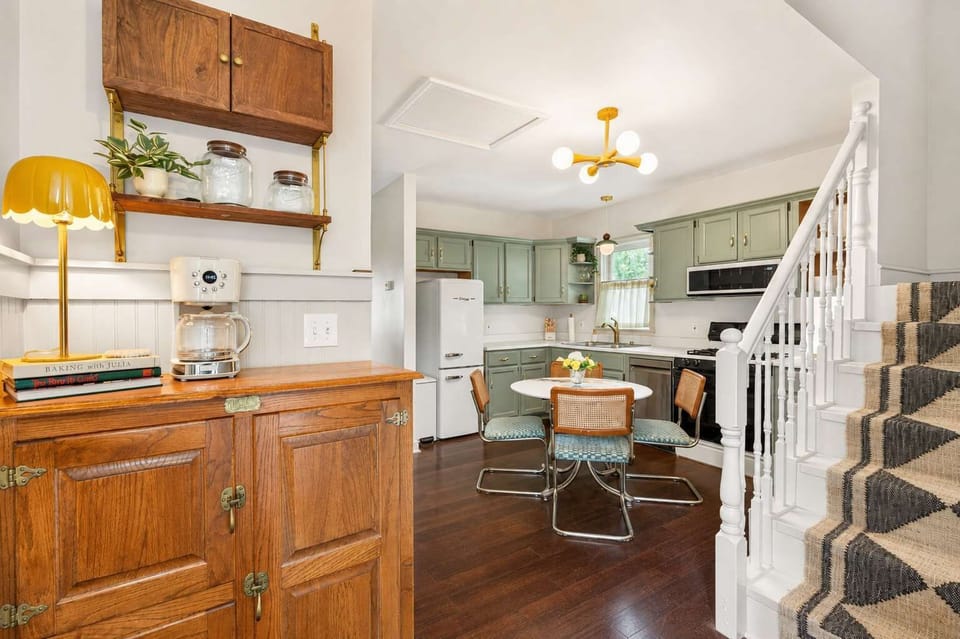 Kitchen: Enjoy the convenience of a fully equipped kitchen paired with a cozy dining area, creating the perfect space for cooking, sharing meals, and making lasting memories together.