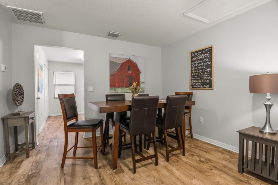 Unit #1 Left: Dining room for 6 people. The dining room connects to the kitchen.