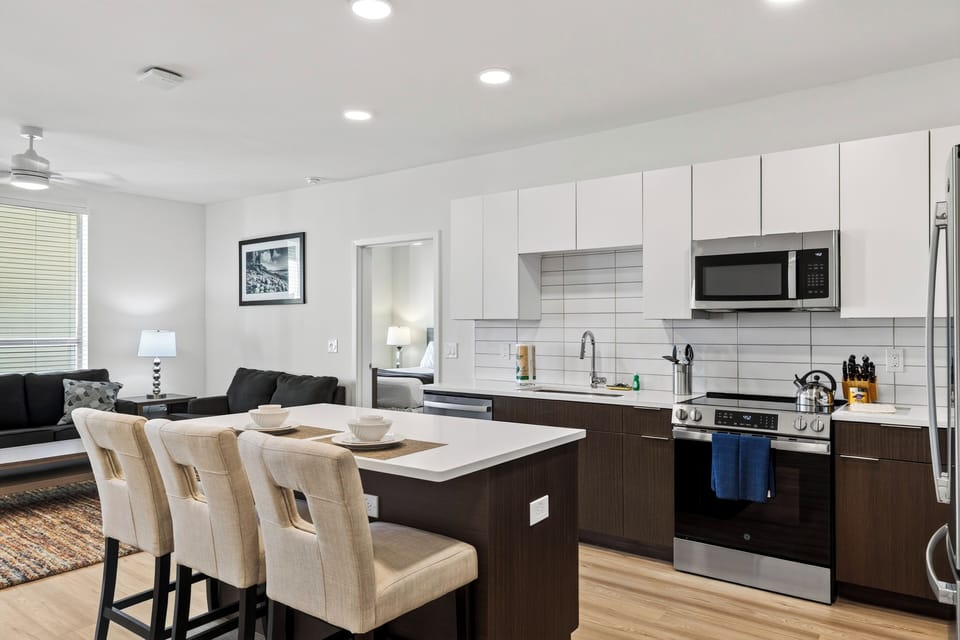 Fully equipped kitchen with generous island seating.