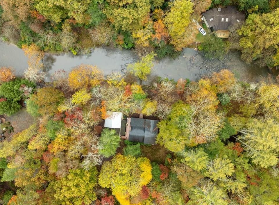 Aerial view of the cabin, river and surrounding areas