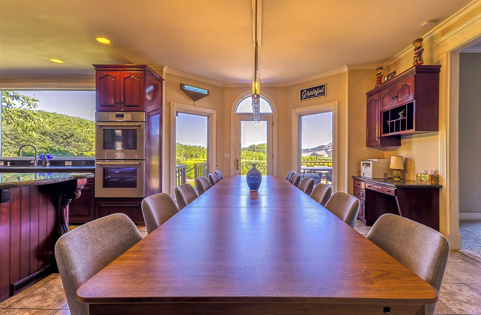 Large dining room with scenic views and seating for group gatherings