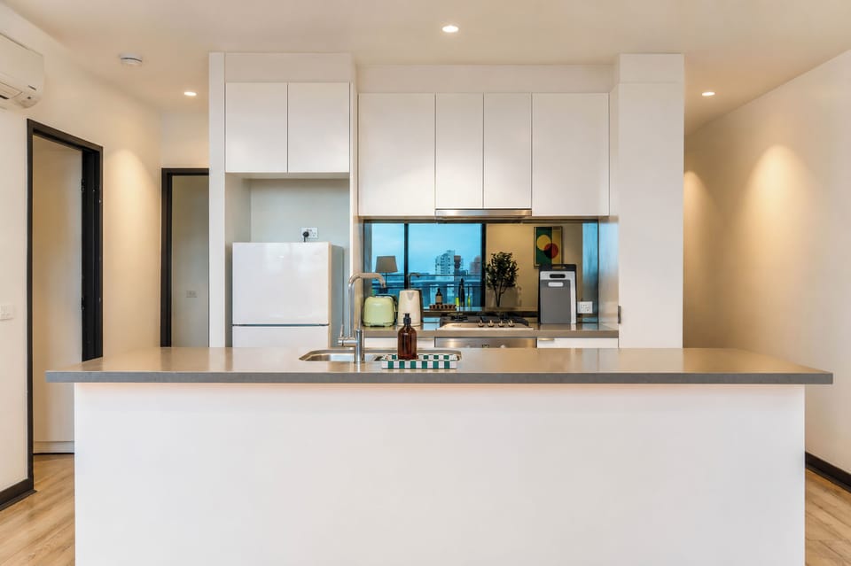 Bright modern kitchen with spacious island and sleek minimalist design