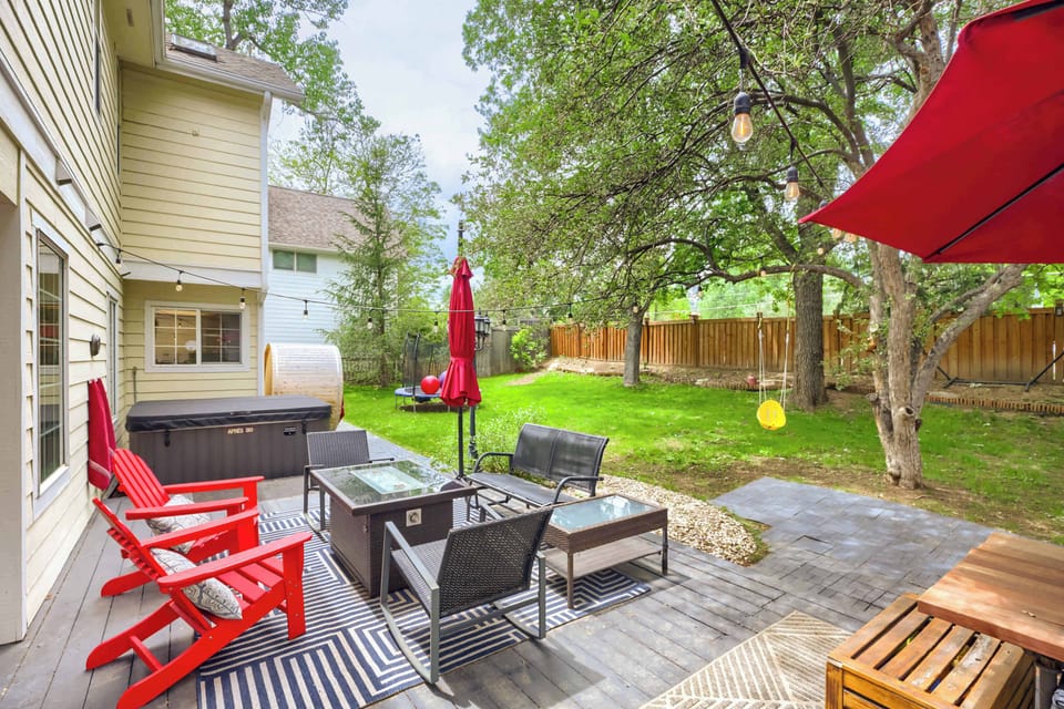 Backyard complete with seating, ho tub and sauna.

**Please note Hot Tub/Sauna Waiver posted in the marketing description before booking**