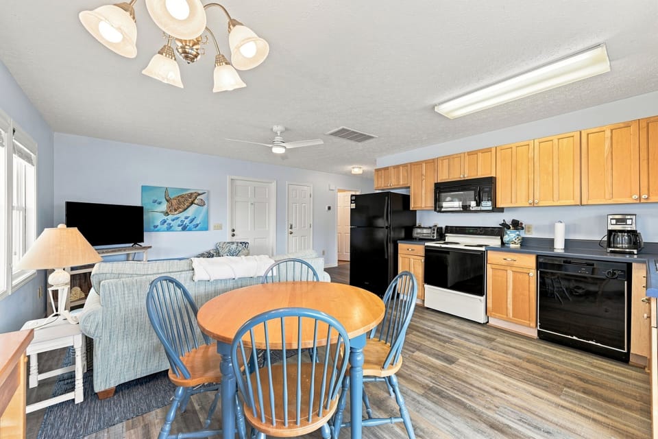 Private In-law suite dining/living/full kitchen.