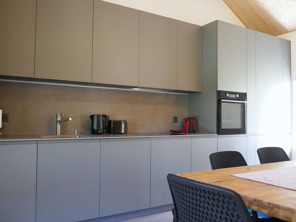Interior Design, Flooring, Wood, Kitchen, Furniture, Countertop, Cabinetry, Ceiling, Kitchen Appliance, Floor
