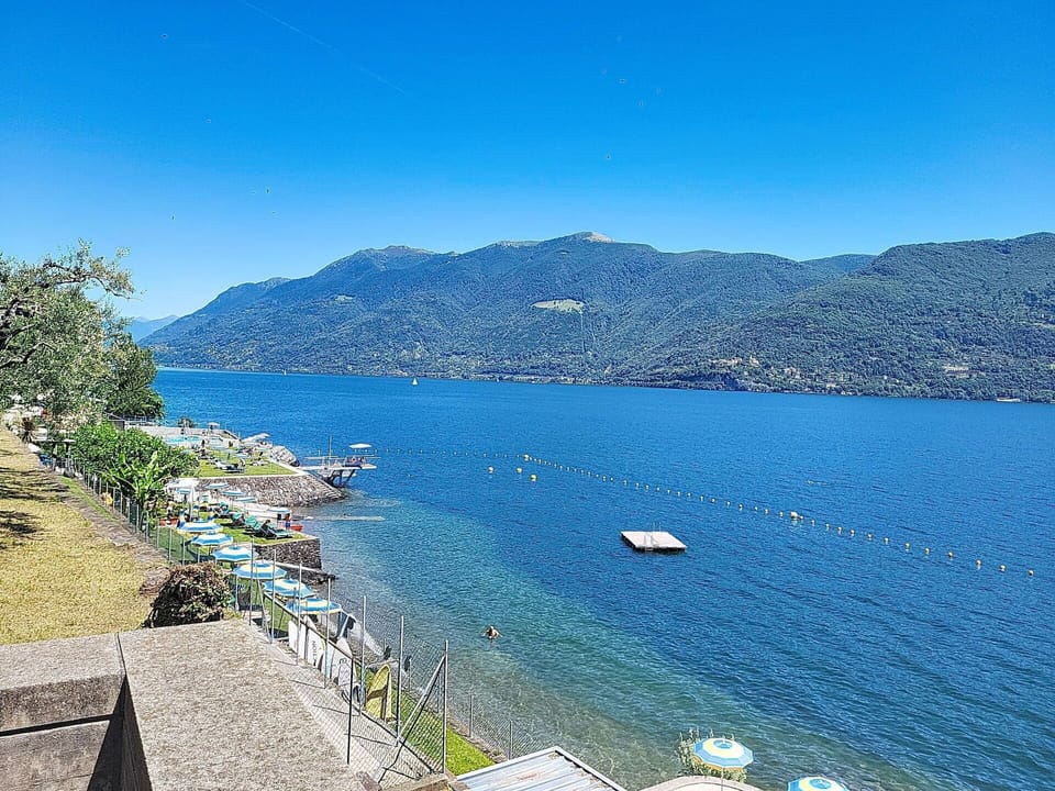 Blue, Water, Mountainous Landforms, Body Of Water, Mountain, Coastal And Oceanic Landforms, Hill, Summer, Coast, Highland