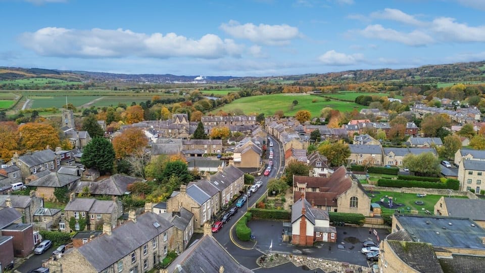 Aerial view over Corbridge village and the surrounding Tyne Valley.