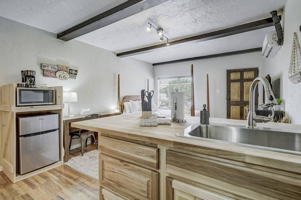 Microwave, mini fridge, coffeemaker, and sink
