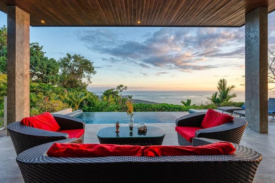 Outdoor lounge area and infinity pool to soak in the incredible ocean views. 
