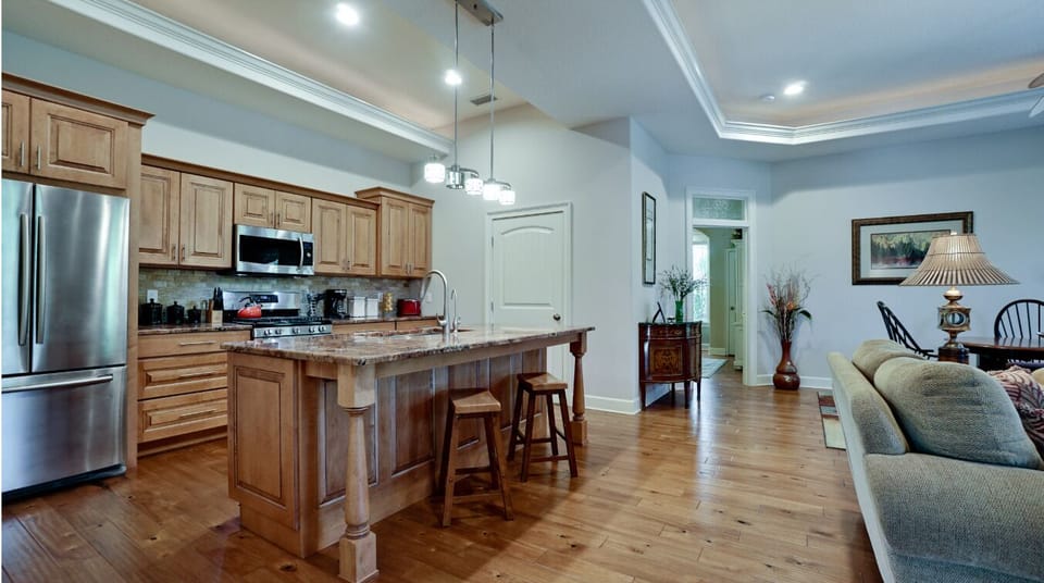 Spacious open-concept kitchen with island seating and elegant finishes