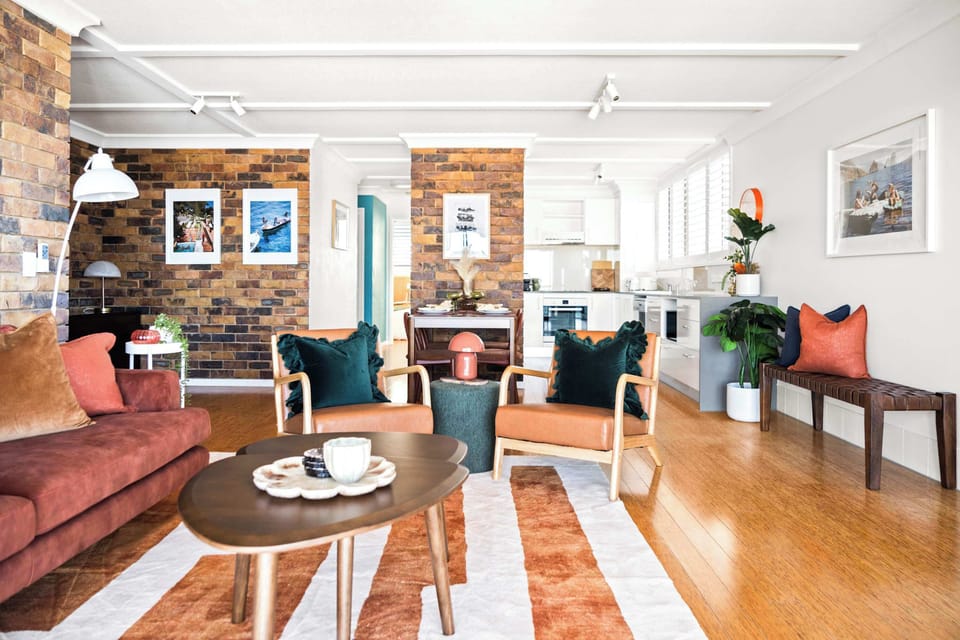 Open plan living area filled with natural light and refreshing sea breezes